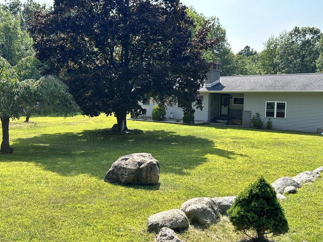 2717 N Sherman Rd, Ludington, MI 49431 - view of green lawn