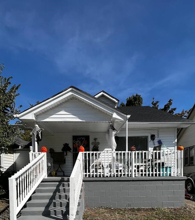 view of front of property featuring covered porch