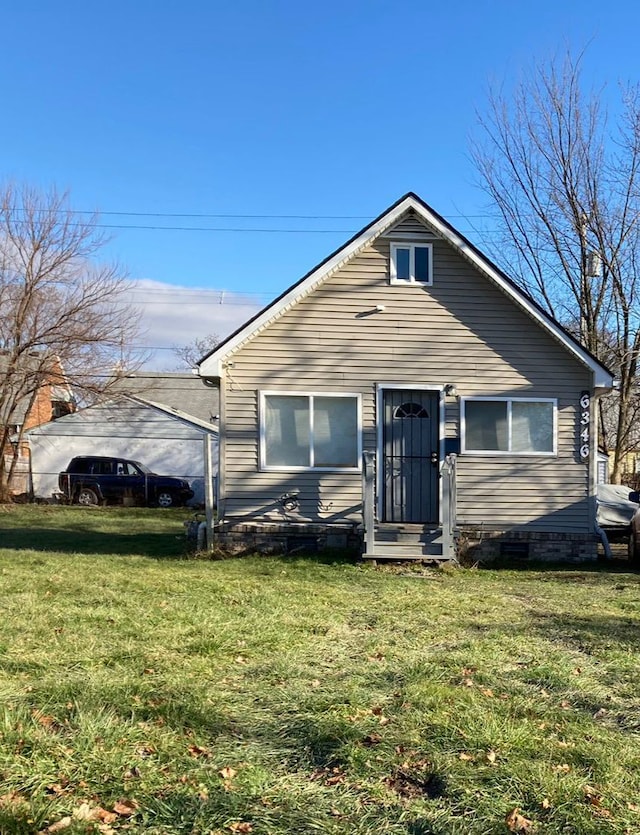 view of front of home with a front yard