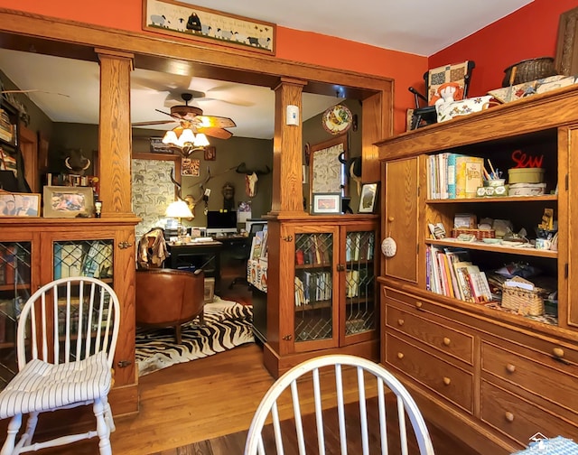 interior space with ceiling fan and hardwood / wood-style floors