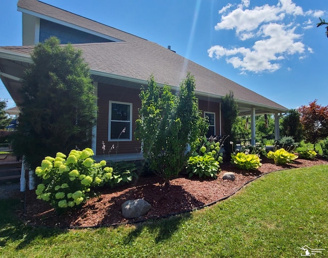 exterior space featuring a front lawn