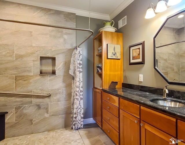 bathroom featuring a shower with curtain, crown molding, and vanity