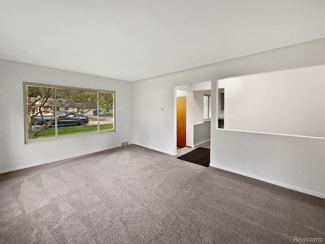 53044 Ruann Dr, Shelby Twp, MI 48316 - spare room featuring baseboards and carpet flooring