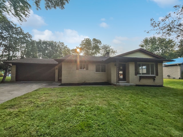 ranch-style home with a front lawn