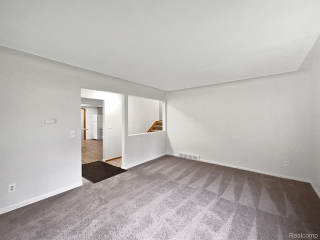 53044 Ruann Dr, Shelby Twp, MI 48316 - carpeted spare room with baseboards and stairway