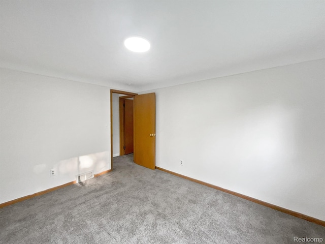 53044 Ruann Dr, Shelby Twp, MI 48316 - empty room featuring carpet and baseboards