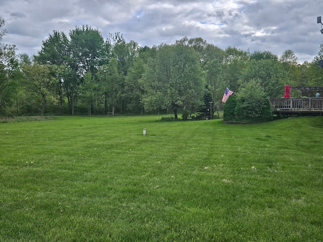 view of yard featuring a deck