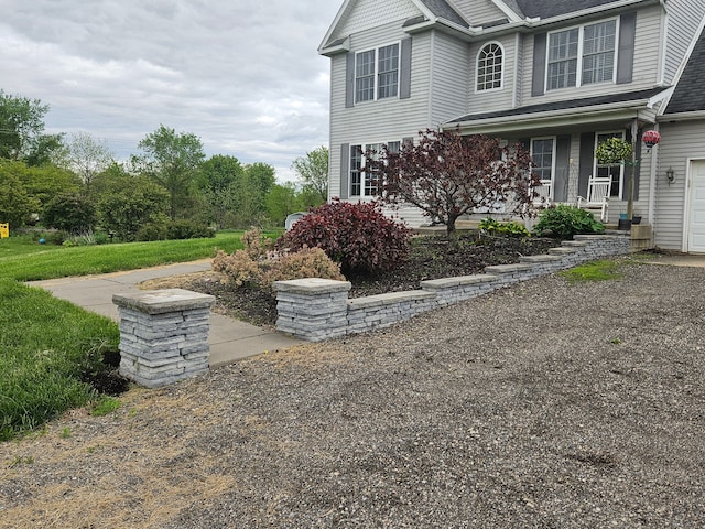 exterior space featuring covered porch