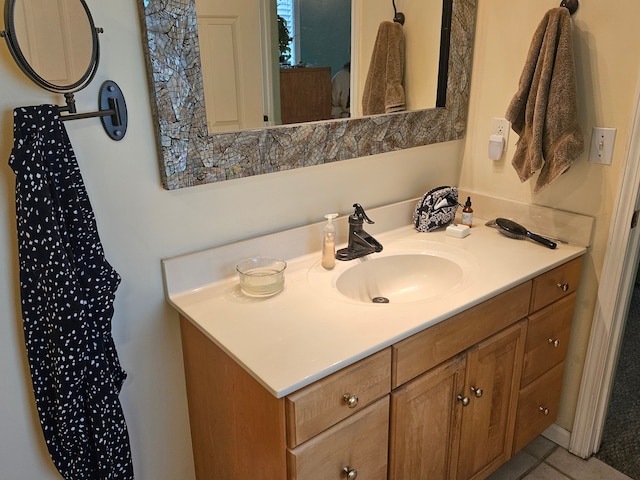 bathroom featuring tile patterned floors and vanity