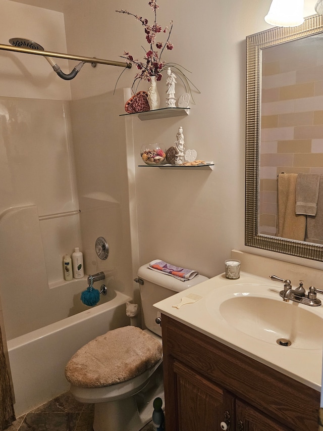 full bathroom with tiled shower / bath combo, toilet, and vanity