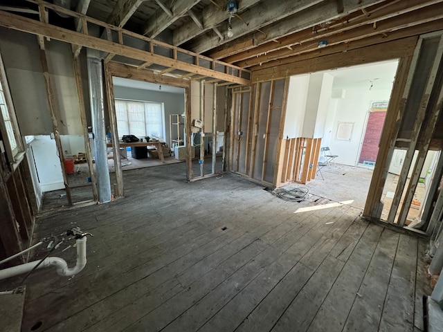 miscellaneous room featuring dark hardwood / wood-style floors