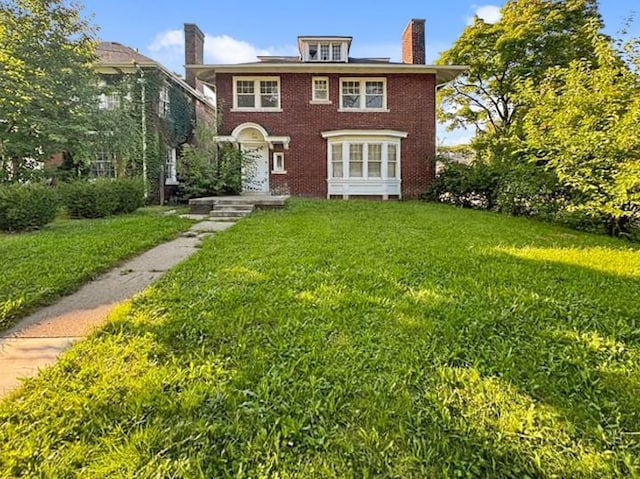 view of front facade featuring a front yard