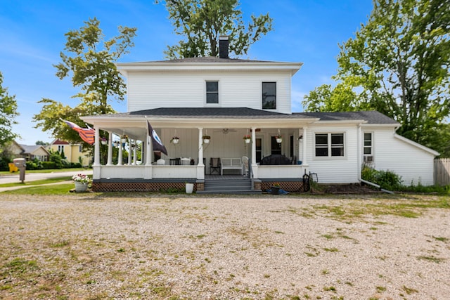 farmhouse featuring covered porch