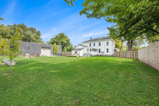 view of yard with a garage