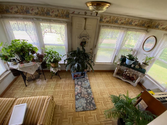 sunroom featuring a wealth of natural light