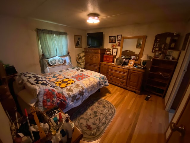 bedroom featuring light hardwood / wood-style floors