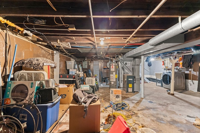 basement featuring heating unit, electric panel, and water heater