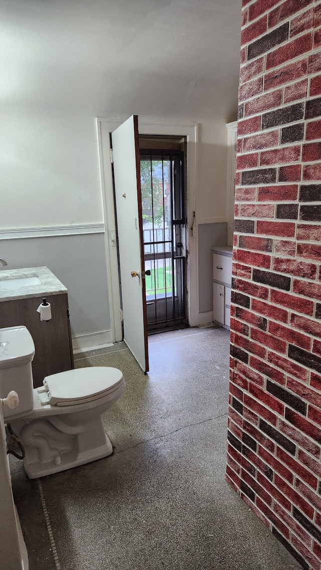 bathroom with toilet and sink