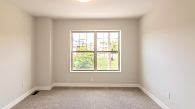 view of carpeted spare room