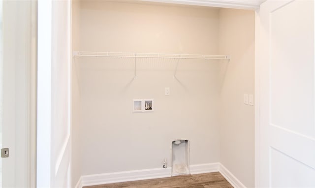 clothes washing area featuring washer hookup, hookup for an electric dryer, gas dryer hookup, and wood-type flooring