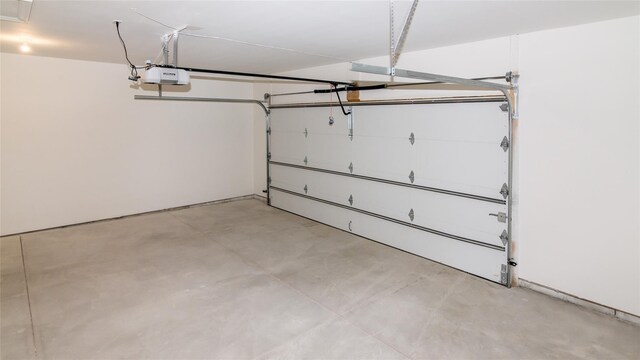 1361 W Canfield St, Detroit, MI 48208 - garage featuring a garage door opener