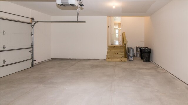 1361 W Canfield St, Detroit, MI 48208 - garage featuring a garage door opener