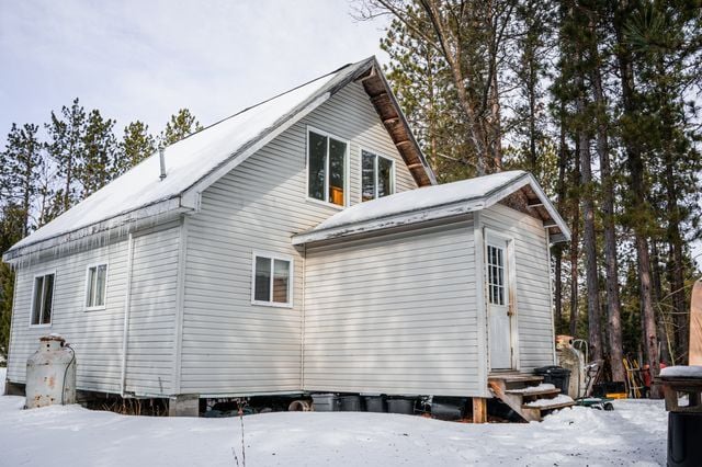 view of snow covered property