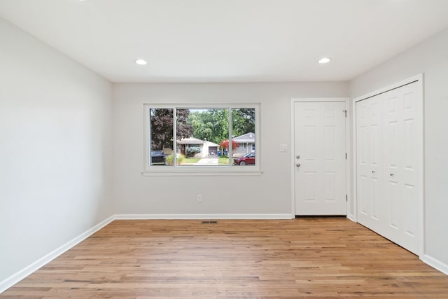 unfurnished bedroom featuring light hardwood / wood-style floors