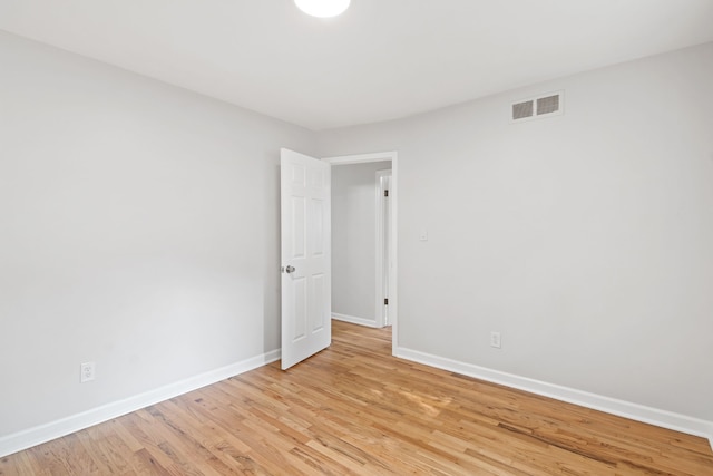 unfurnished room featuring light hardwood / wood-style flooring