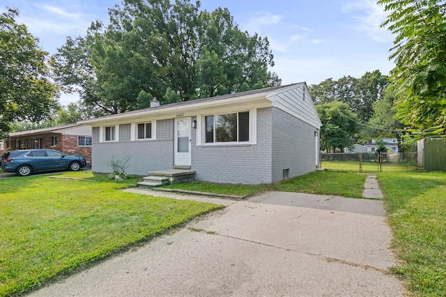 view of front of home with a front yard