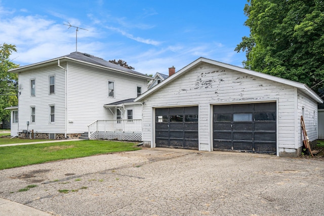 exterior space featuring a yard and a wooden deck