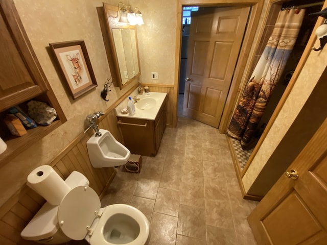 bathroom with sink, toilet, and walk in shower