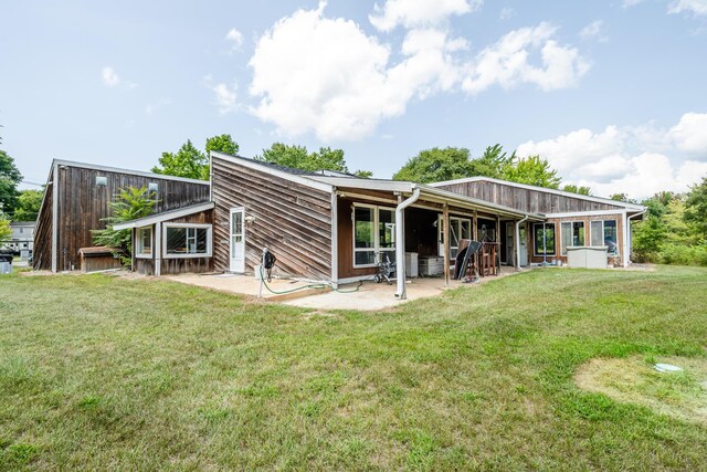 5419 N Watervliet Rd, Watervliet, MI 49098 - rear view of property featuring a patio area and a yard