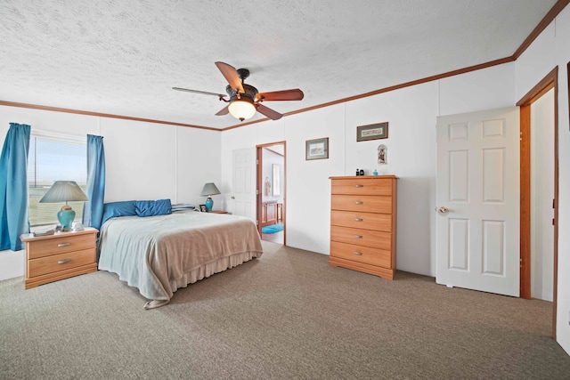 carpeted bedroom featuring ceiling fan, crown molding, and a textured ceiling