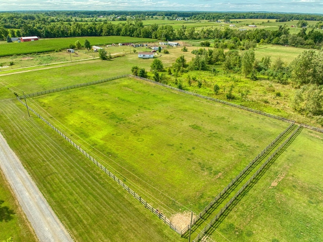 birds eye view of property with a rural view