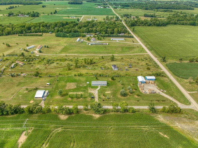 birds eye view of property featuring a rural view