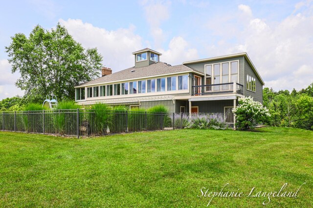 7300 Packer Dr NE, Belmont, MI 49306 - back of house featuring a chimney
