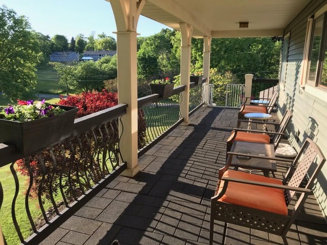 7300 Packer Dr NE, Belmont, MI 49306 - view of covered porch