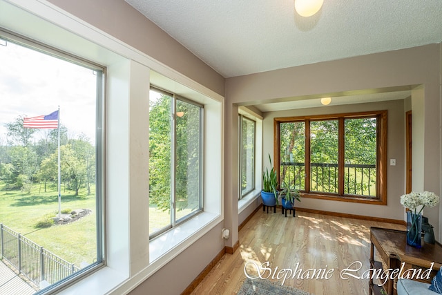 sunroom featuring a healthy amount of sunlight