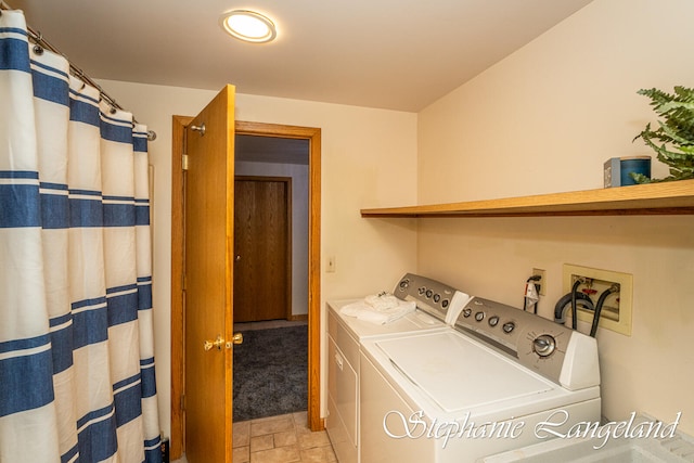 laundry room with washer and dryer