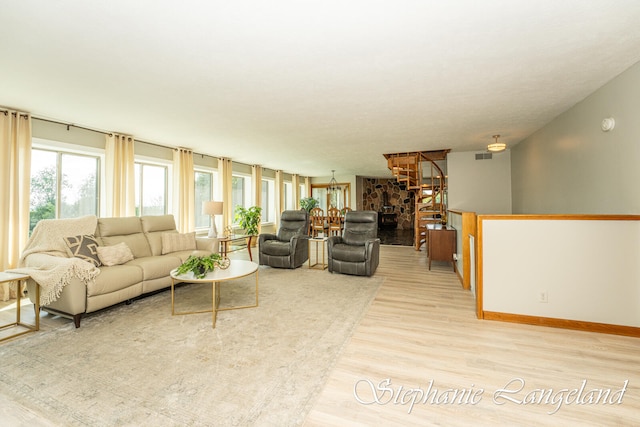 living room with light hardwood / wood-style floors