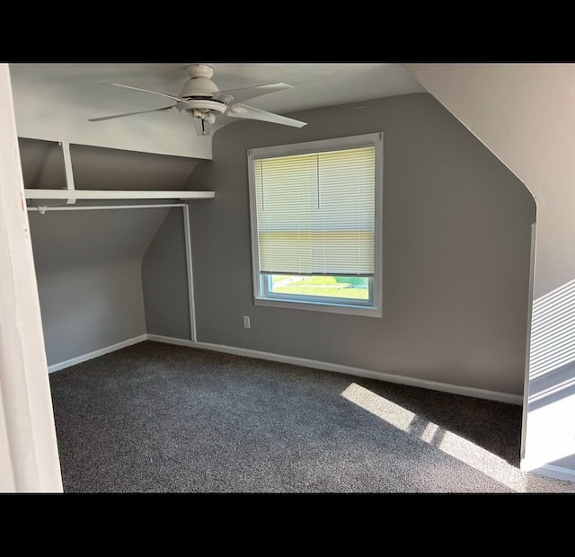 bonus room featuring carpet, lofted ceiling, and ceiling fan