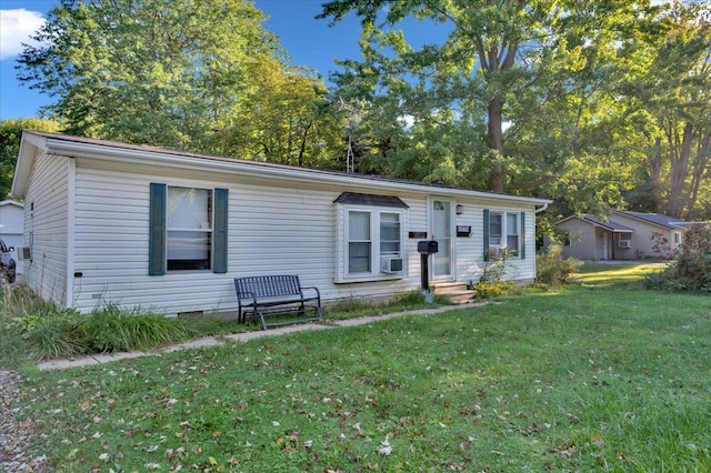 view of front facade with a front lawn