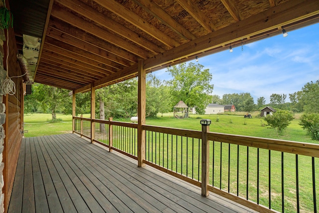 deck featuring a lawn