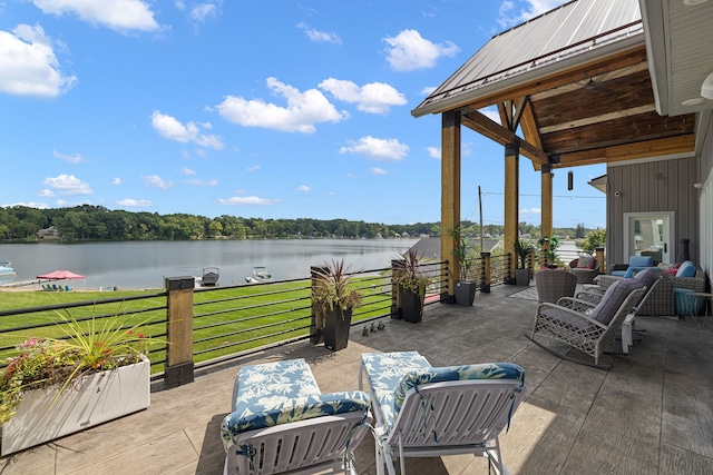 view of patio with a gazebo and a water view