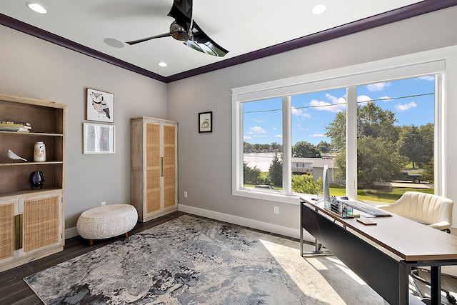 office featuring dark hardwood / wood-style floors, ceiling fan, and crown molding