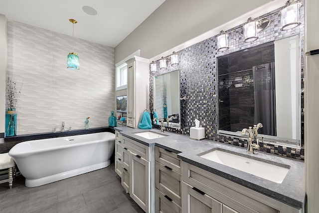 bathroom with tasteful backsplash, a bath, and tile walls