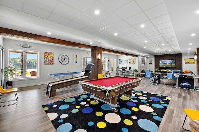 recreation room featuring a drop ceiling, wood-type flooring, and billiards