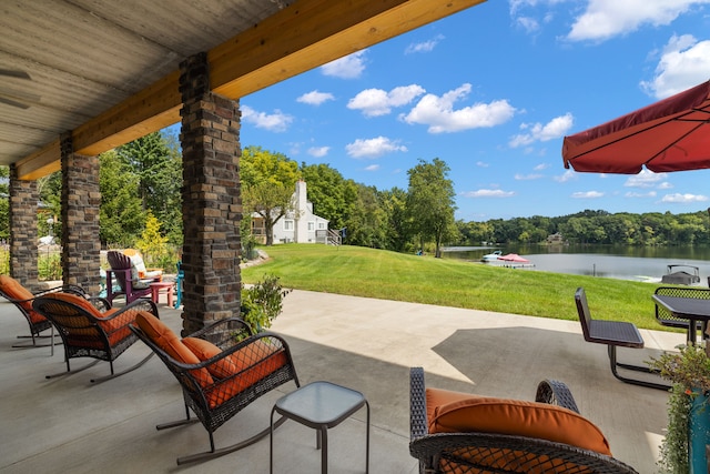 view of patio / terrace featuring a water view