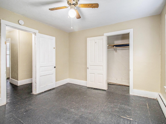 unfurnished bedroom with ceiling fan and a baseboard heating unit